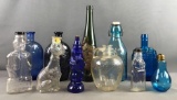 Group of 11 vintage uniquely shaped collectible glass bottles