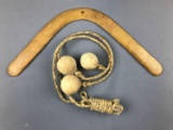 Vintage Boomerang and Rope with weighted leather balls