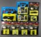 Group of 9 Ertl Batman die cast figures and Batmobile in original packaging