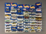 Group of 49 Hot Wheels Die-Cast Vehicles In Original Packages