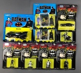 Group of 9 Ertl Batman die cast figures and Batmobile in original packaging