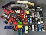 Group of 50+ die-cast and plastic vehicles