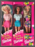 Group of 3 Barbie dolls in original packaging