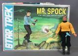 Group of 2 Star Trek collectibles: Migo Captain Kirk action figure and Mr. Spock Model kit