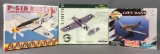 Group of 3 die-cast metal airplane coin banks in original packaging