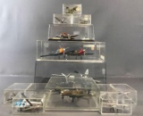 Group of 15 toy airplane replicas in display cases