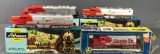 Group of 4 HO scale model train cars in original packaging