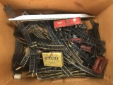 Box lot of O scale train track pieces and more