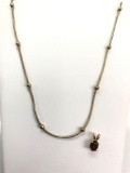 Yellow Gold over Sterling Necklace and Garnet Pendant