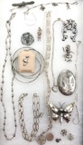 Fashionable Silvertone Chain Necklaces, Brooches, and Pendants