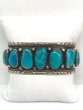 Native American Signed Sterling Silver and Bezel Set Turquoise Cuff Bracelet