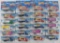 Group of 22 Hot Wheels Haulers Die-Cast Semi Trucks in Original Packaging