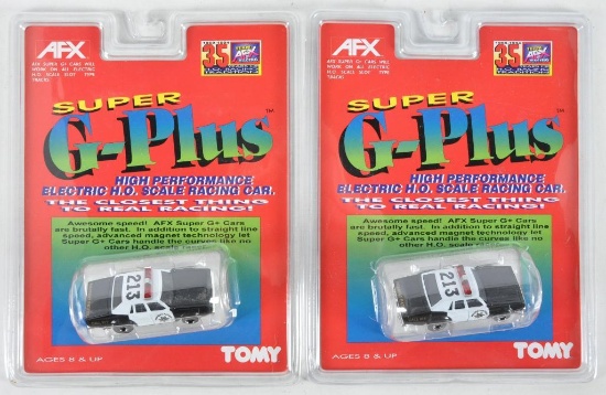 Group of 2 Tomy AFX Super G-Plus Slot Cars with Original Packaging