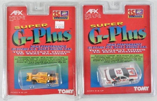Group of 2 Tomy AFX Super G-Plus Slot Cars with Original Packaging