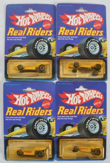 Group of 4 Hot Wheels Real Riders Lightning Gold Die-Cast Vehicles in Original Packaging