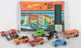 Group of 9 Hot Wheels Die-Cast Vehicles and Popup Speed Shop