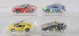 Group of 4 AFX HO Slot Cars