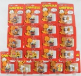 Group of 21 ERTL Garfield Vehicles in Original Packaging