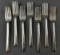 Group of 7 vintage CM St P and P railroad flatware forks