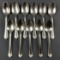 Group of 11 Pullman company teaspoons