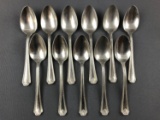 Group of 11 vintage Pullman Company teaspoons