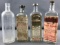 Group of 4 vintage embalming fluid glass bottles