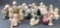 Group of 20 porcelain Kewpie figurines and trinket boxes