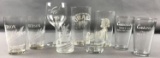 Group of 9 antique advertising beverage glasses