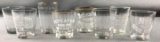 Group of antique advertising shot glasses