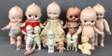 Group of 13 porcelain Kewpie dolls and figurines