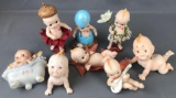 Group of 8 porcelain Kewpie figurines