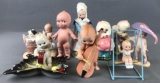 Group of 9 porcelain Kewpie figurines