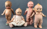 Group of 4 composition Kewpie dolls