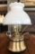 Brass accent lamp with glass shade