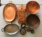 Group of vintage copper items including platters and measuring cups