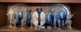 Group of clear and blue glass items