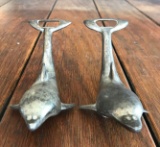 Group of 2 silver plated dolphin bottle openers