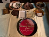 Group of vintage ashtrays and a beer tray