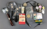 Group of random items, watches, magnifying glasses and more