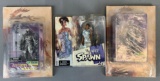 Group of three Spawn action figures and graphic novel