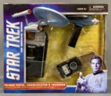 Star Trek the original series phaser pistol, communicator, and triquarter set