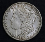 1887 P Morgan Silver Dollar.