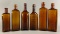 Group of 6 : Antique Amber Bottles w/ Embossed Lettering