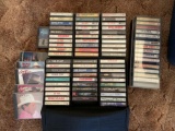 Group of Cassette Tapes and CDs