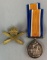 WW1 British War Service Medal for Machine Gunner F.J.E. Webber, and MG Cap Badge