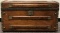 Wooden chest with brass trim