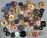 Group of 40+ polished natural stone donut discs