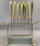 12 piece set vintage knives in metal and glass stand