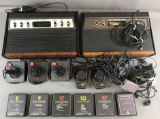 Group of 2 Vintage Video Game Consoles, game cartridges and more-Atari and Sears Video Arcade