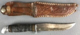 Fixed blade knife with embossed leather sheath